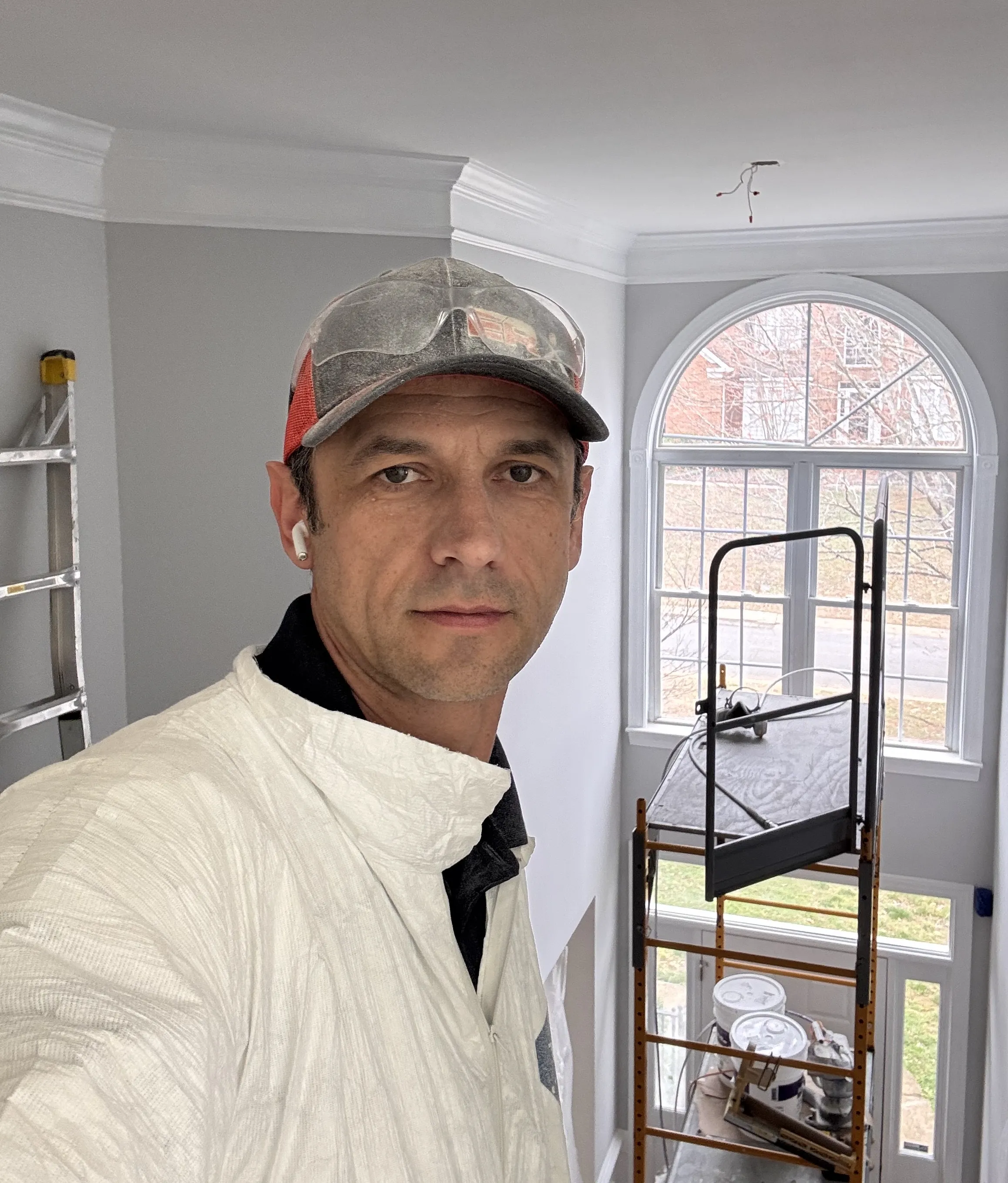 Oledia Solutions owner Oleksii — professional painting contractor serving Charlotte NC