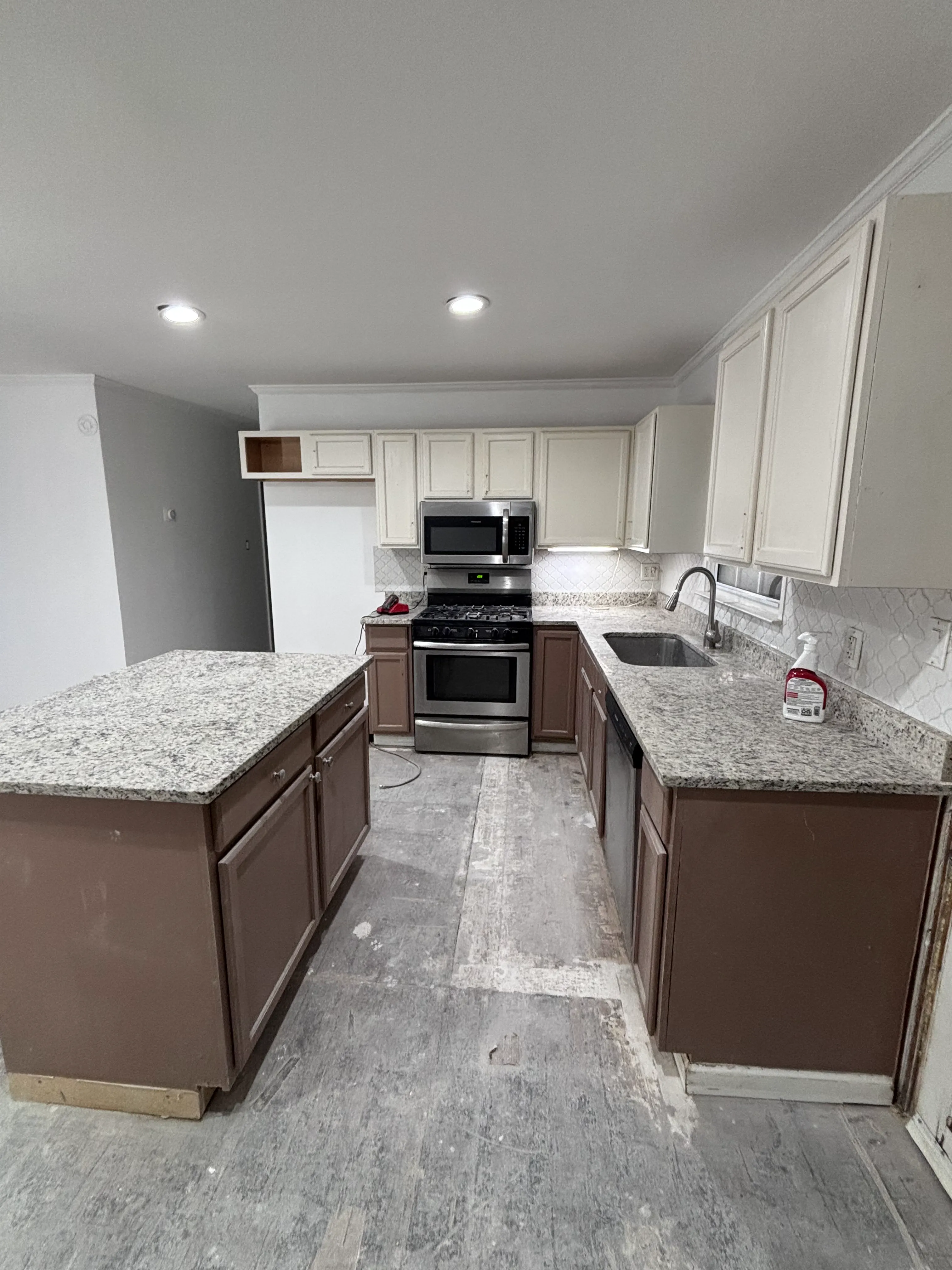 Before kitchen cabinet refinishing project